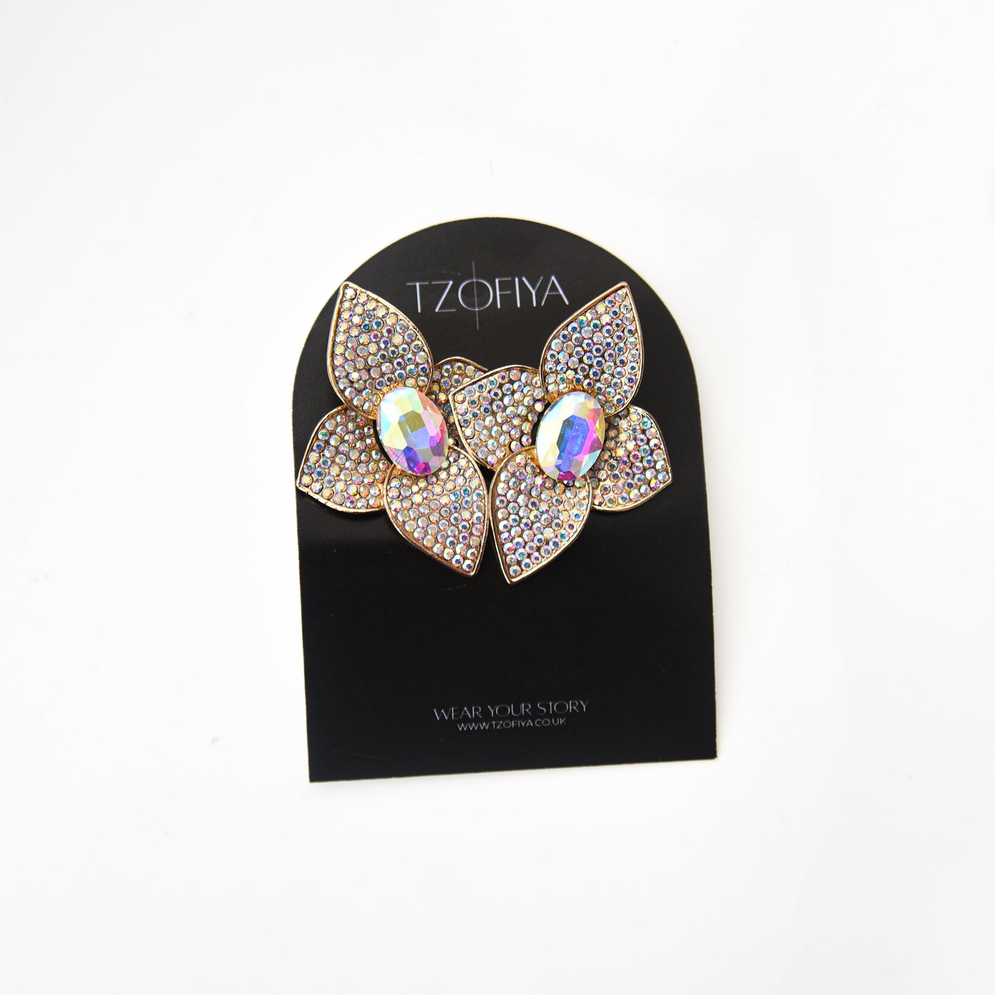 Butterfly-shaped earrings on a black card with 'TZOFIYA' branding on a white background