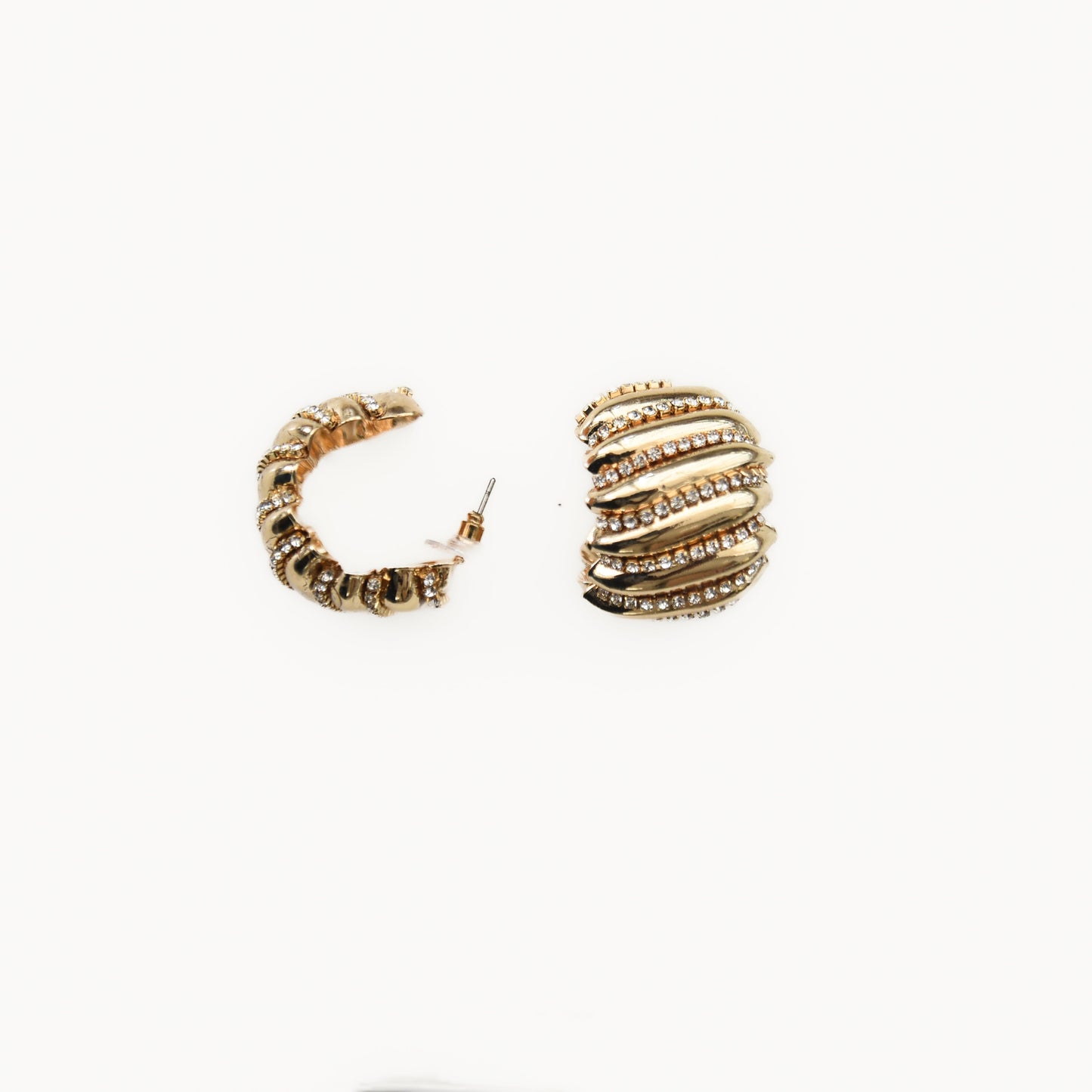 Gold hoop earrings on a white background