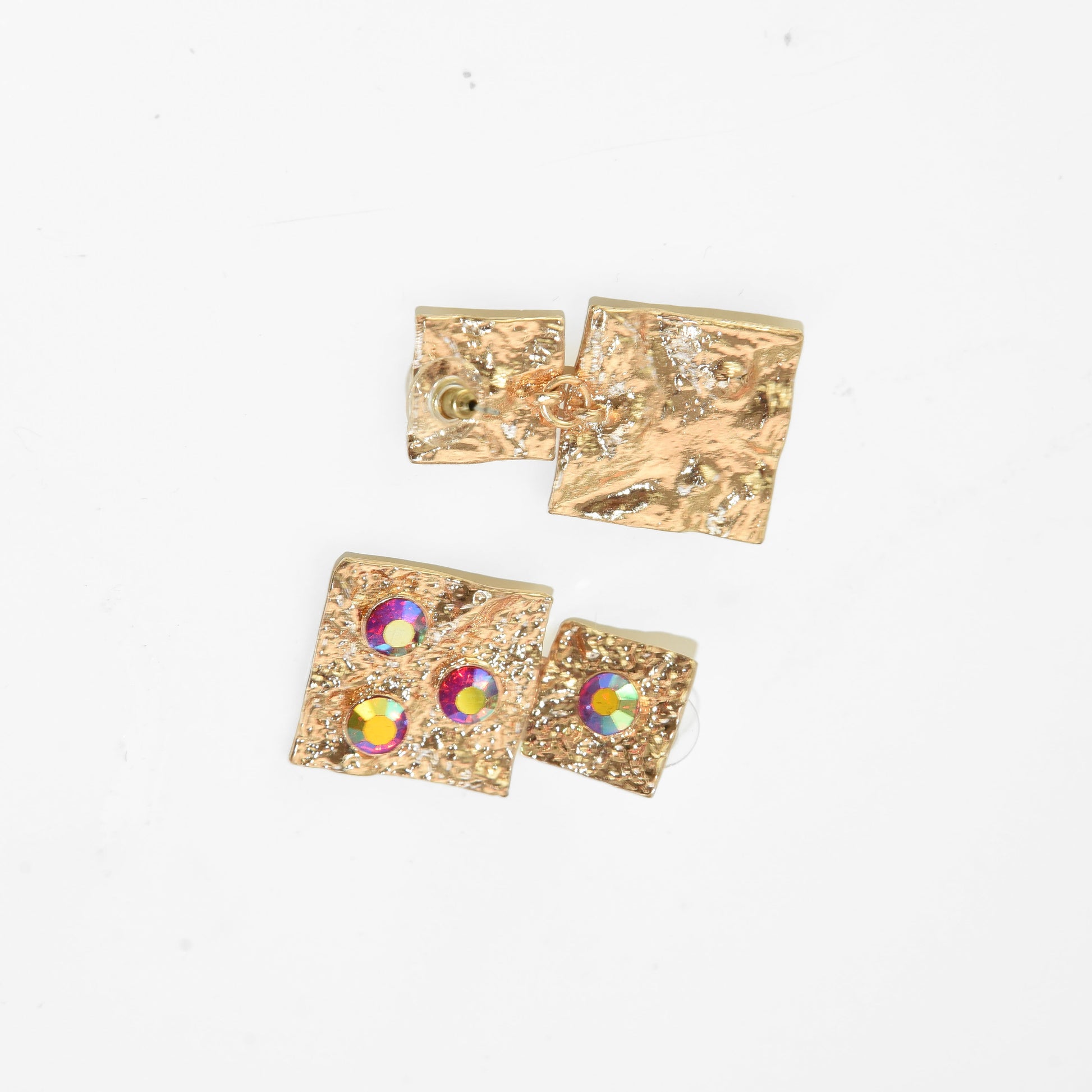 Gold square earrings with gemstones on a white background